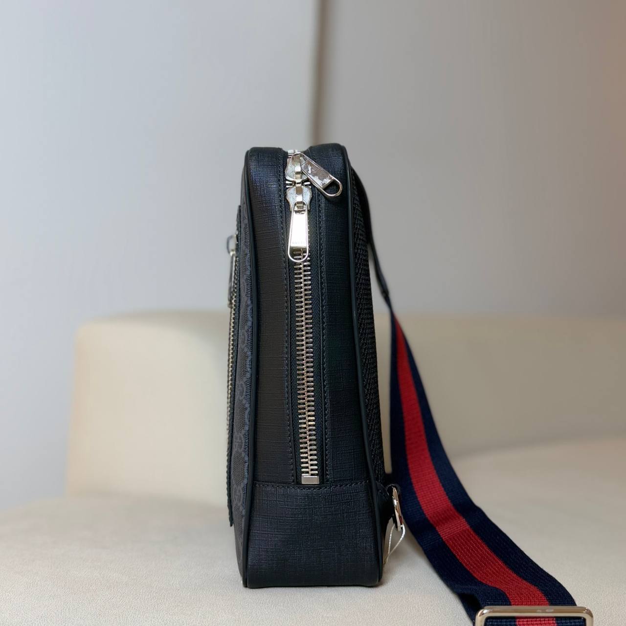 Gucci GG Supreme Sling Backpack
